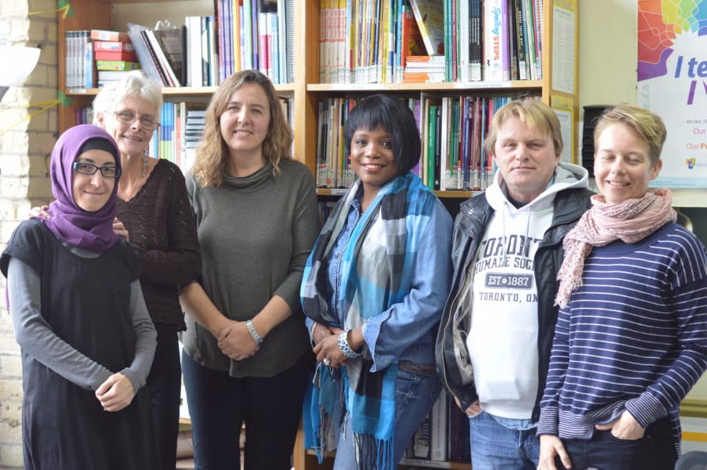A group of members and support staff that all work together to improve literacy for one another. Photo taken by Meg Marshall.