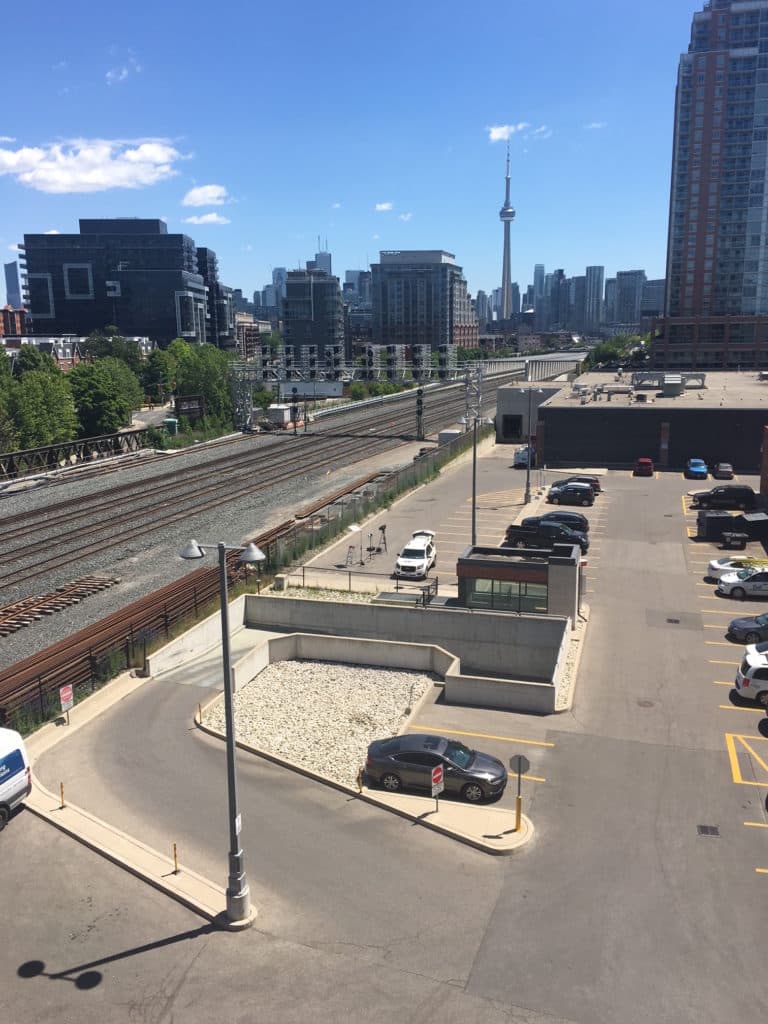 Aerial view of the rail tracks from the King St W. and Hanna Ave area