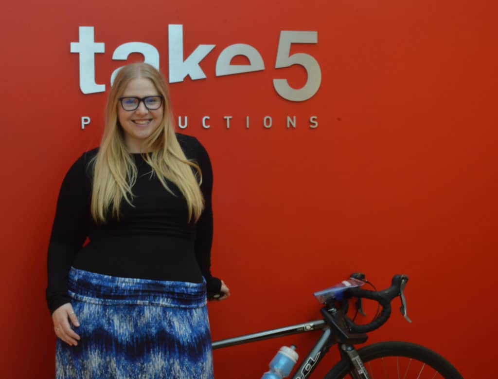 Rachel McKim and her bike that will be making the journey from Toronto to Montreal. Photo credit - Meg Marshall.