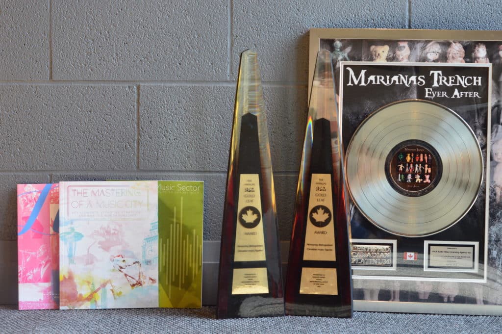 Some examples of the Gold and Platinum Recording Awards that are given out by Music Canada. Photo Credit to Meg Marshall.