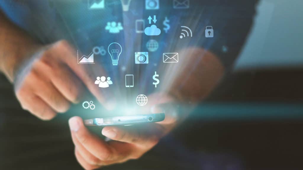 Businessman using mobile smart phone.Social media concept. | Liberty Village Toronto | Your Online Neighbourhood Guide